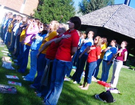 flag retreat, women saying pledge of allegiance